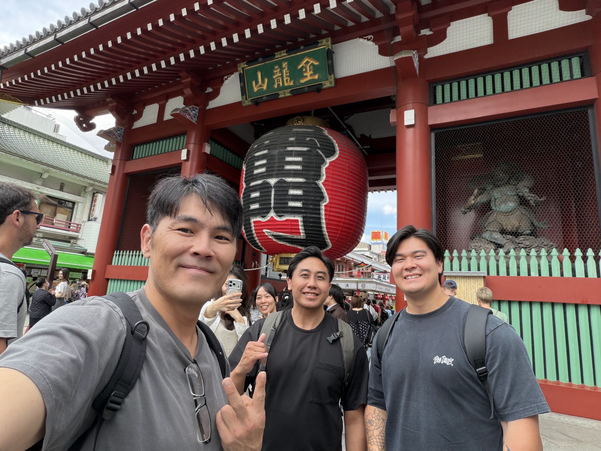 Three of the Enlighten team under the great lantern at the Kaminarimon gate in Asakusa, Tokyo.