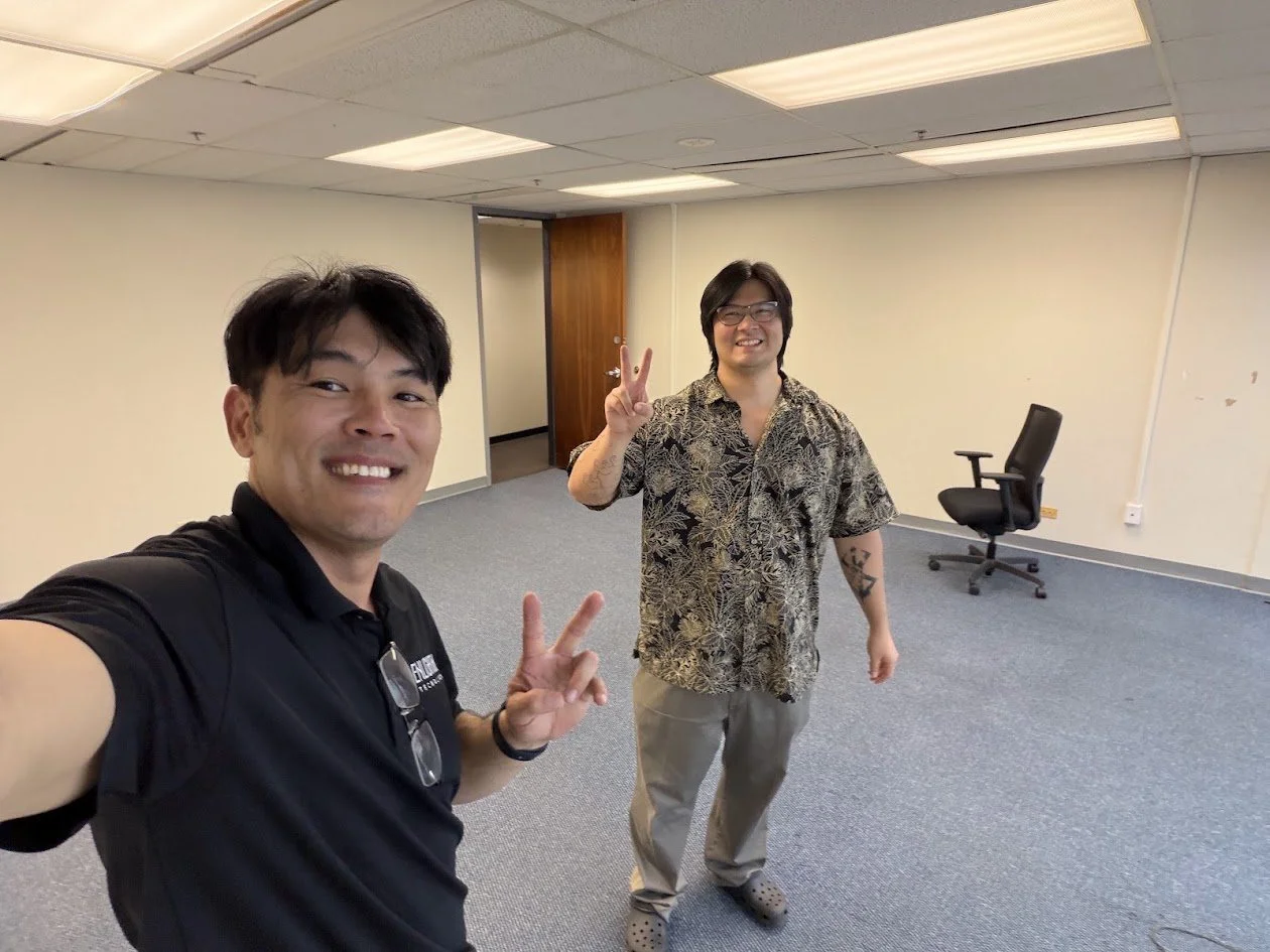 Enlighten team members together on site.