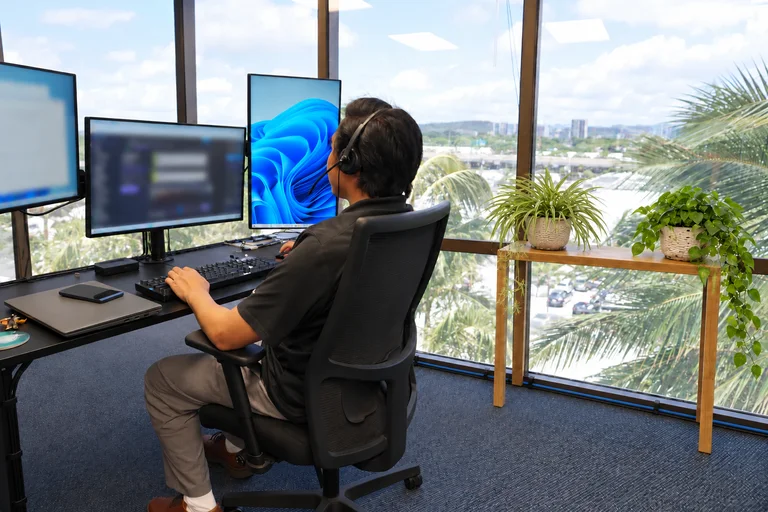 An Enlighten technician at work in our Honolulu office.