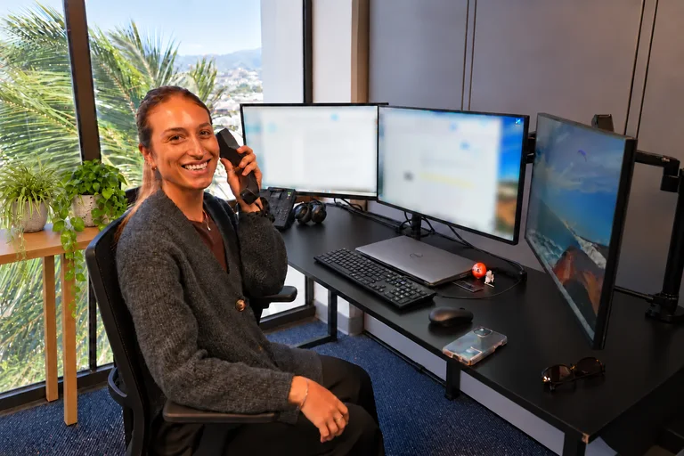 An Enlighten team member answering the phone.